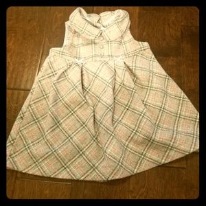 Grey and pink jumper.